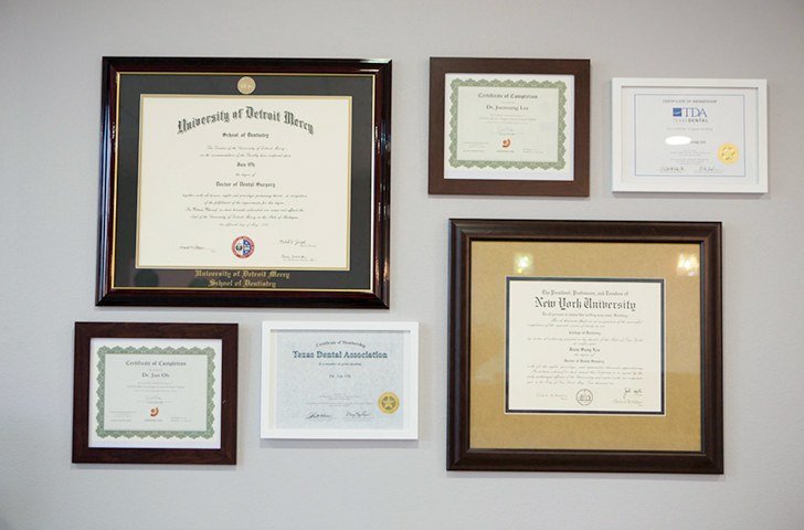 Diplomas hangin on wall